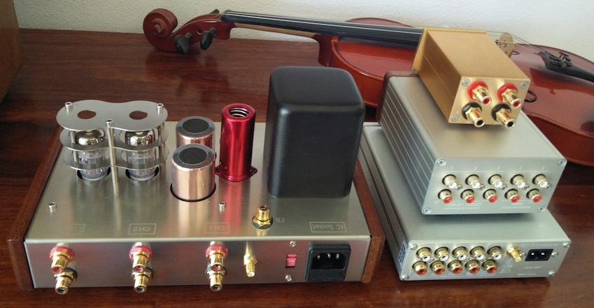 [Four inexpensive preamps - rear view]