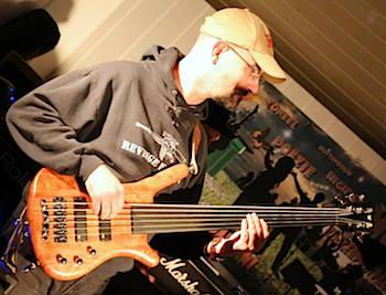 [Frank playing fretless bass]