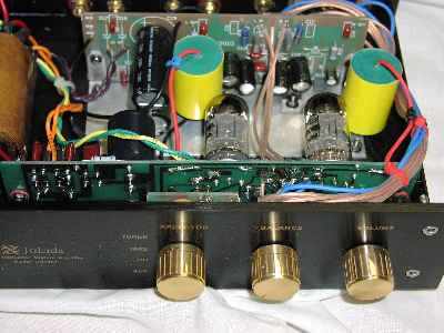 [the auracaps jump out but look closer, you can see the blackgates and dale resistors plus the jena wire]