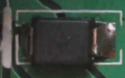 [SMD diode showing no obvious sign of polarity]