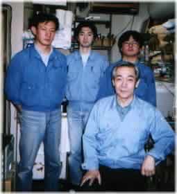 [Kondo-San at the front; on the back are messrs Ashizawa (Manager, Acoustic Development), Oda (makes capacitors and resistors), Yoshida (amplifier wiring) from left to right]