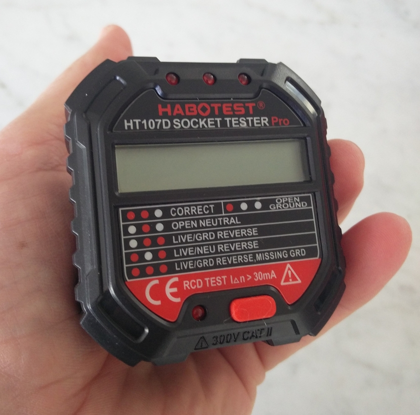 [Habotest HT107D in hand]