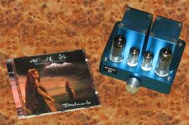 [MiniWatt amplifier shown with CD case for scale]