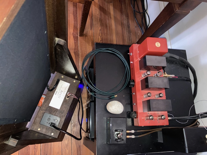 [Stax, behind speaker]